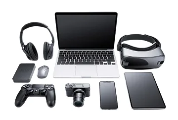 Collection of modern electronic devices including a laptop, smartphone, tablet, wireless headphones, gaming controller, digital camera, VR headset, mouse, and portable hard drive arranged neatly on a white background.